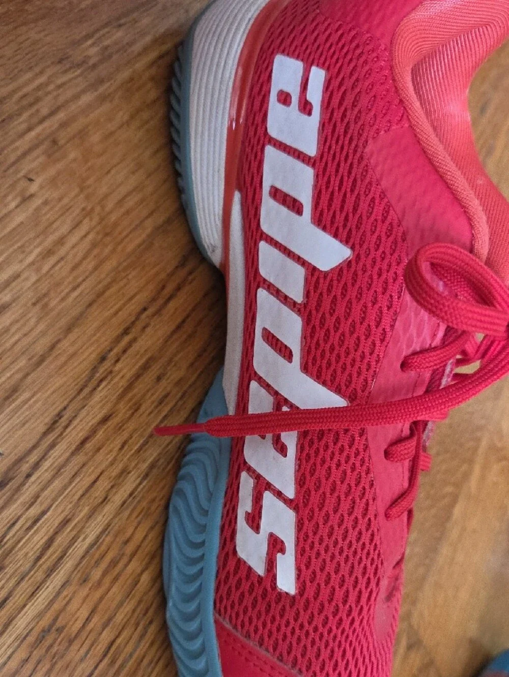 Red ADIDAS Tennis Shoes with Blue Soles